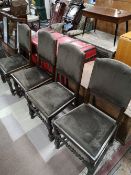 A set of four carved oak early twentieth century chairs