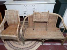 A two seater wicker settee,
