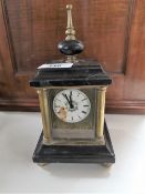 A nineteenth century continental carriage clock on slate and brass