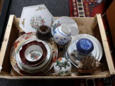 A crate of Ringtons tea caddy,