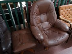 A brown leather relaxer chair with footstool.