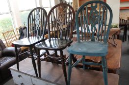 Three Windsor style dining chairs