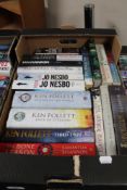 A box of paperback books