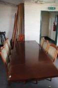 A reproduction mahogany extending dining table and six chairs