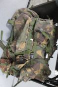 Three army rucksacks