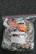A bag of costume jewellery