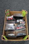 A crate of die cast racing cars,