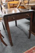 An early 19th century mahogany Pembroke table
