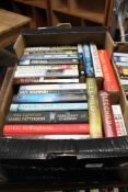 A box of paperback books