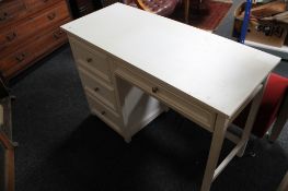 A white contemporary four drawer desk