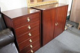 A contemporary mahogany double door cupboard and matching six drawer chest