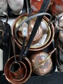 A tray of antique and later copper, saucepans,