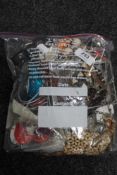 A bag of costume jewellery