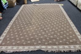 A fringed contemporary carpet