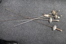 Five fencing foils