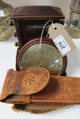 A calendar desk stand, barometer and compass,