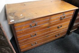 An Edwardian four drawer chest