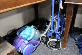 A folding wheelchair and a Dyson vacuum