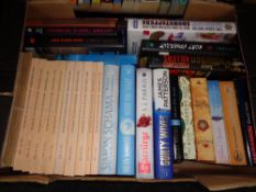 A box of hardback and paperback books; novels to include James Patterson,