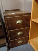 An oak three drawer chest CONDITION REPORT: 50cm deep by 35cm wide by 57cm high.