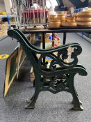 A pair of cast iron bench ends