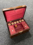 A Victorian mother of pearl inlaid sewing box