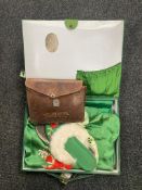 A hand stitched green silk Japanese style gown and slippers in case together with a leather cased