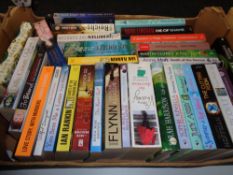 A box of paperback books; novels to include Tess Gerritsen,