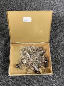 A tin of a collection of silver jewellery