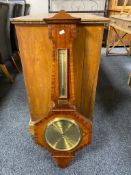An early 20th century mahogany barometer with brass dial and presentation plaque