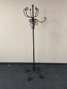 A metal hat and coat stand
