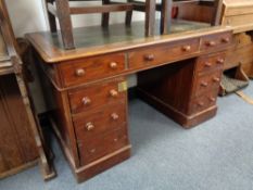 A Victorian mahogany pedestal desk
