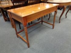 An inlaid mahogany side table width 107, depth 55.5 cm, height 72.5 cm.