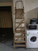 A set of folding wooden steps