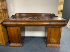 A nineteenth century mahogany pedestal sideboard