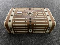 An antique rosewood bone bound workbox