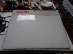 An Artagraph light tracer II light box