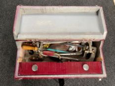 A wooden joiner's tool box of hand tools