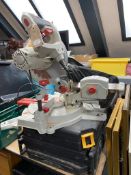 A Performance 210 MM slide compound mitre saw together with a Pro tool chest containing socket sets