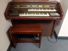 An electric GEM organ with stool