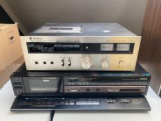 A Technics stereo cassette deck 610 together with a Aiwa stereo cassette deck AD-R460