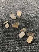 Three pairs of silver cuff links