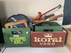 Two plastic Tuborg beer crates together with a wooden Koral beer crate,