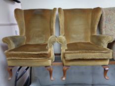 A pair of dralon mustard coloured armchairs