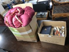 A box containing table linen, vintage quilt and bed cover,