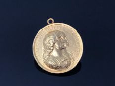 A Charles II yellow metal medallion Charles and Catherine Colonization medal 1670