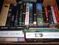 A box of hardback and paperback books; novels to include Martina Cole,