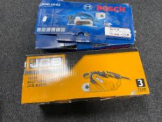A boxed Bosch electric planer together with a JVC boxed belt sander