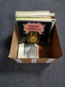 A box of vinyl LP's and seven inch singles,