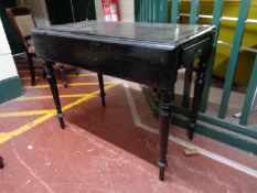 An antique painted pine kitchen table fitted a drawer
